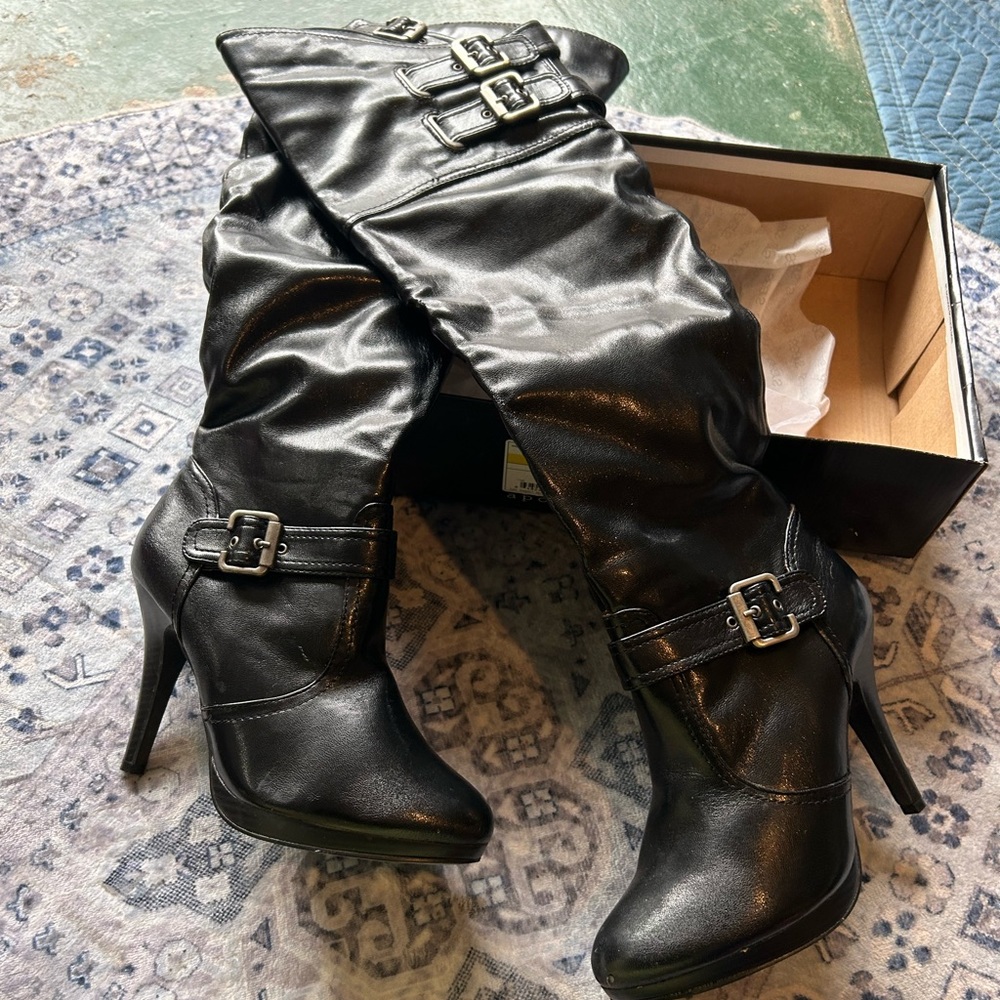 Knee high heeled boots